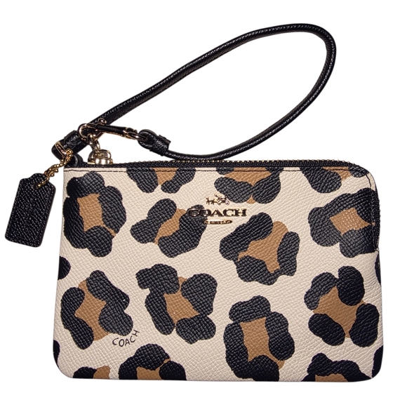 Coach Handbags - COACH NWOT Ocelot Print Leather Corner Zip Wristlet